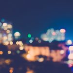 a blurry photo of a city at night